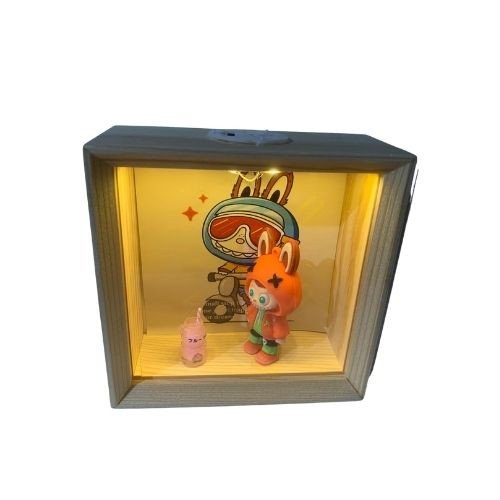 Figure with Rabbit Hood